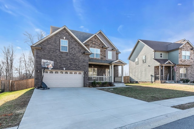 view of front facade featuring fence, a front yard, covered porch, a garage, and driveway