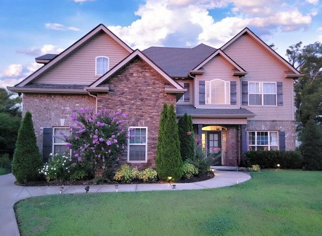 view of front of home with a front lawn