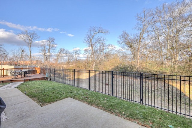 view of yard with a wooden deck