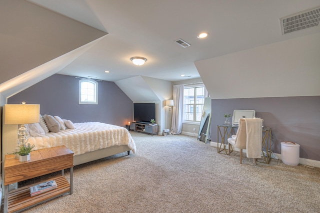 carpeted bedroom featuring vaulted ceiling