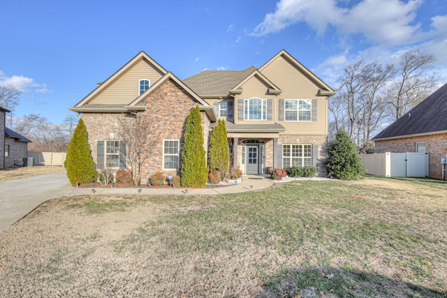 craftsman house with a front lawn