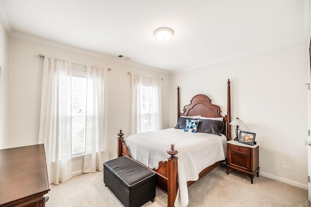 carpeted bedroom with ornamental molding