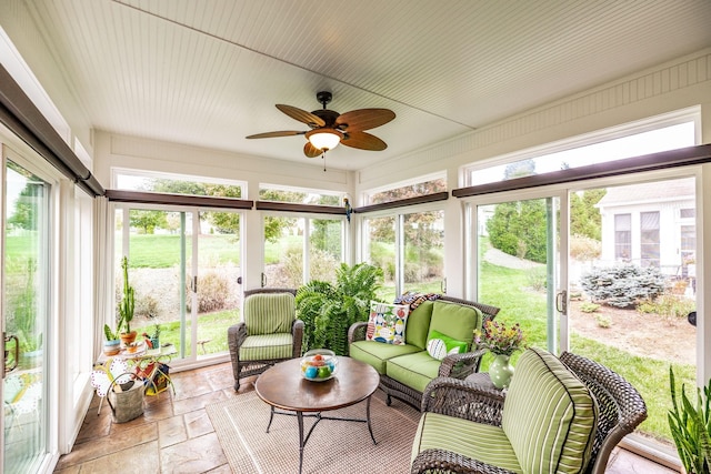 sunroom / solarium with ceiling fan