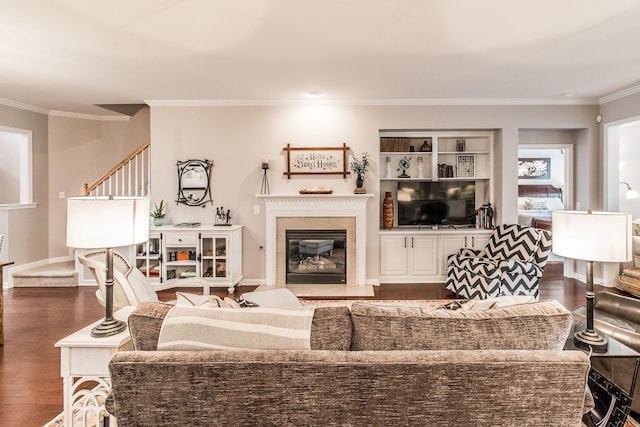 living room featuring ornamental molding and hardwood / wood-style flooring