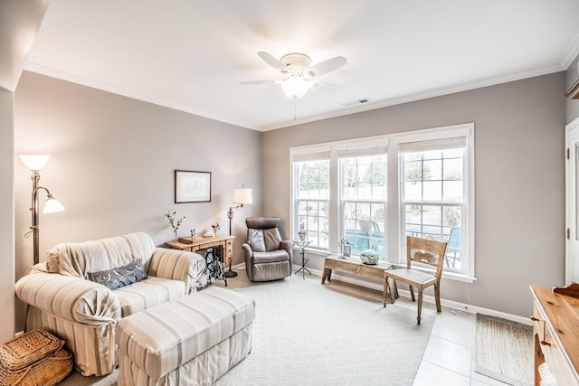 tiled living room featuring ceiling fan and crown molding