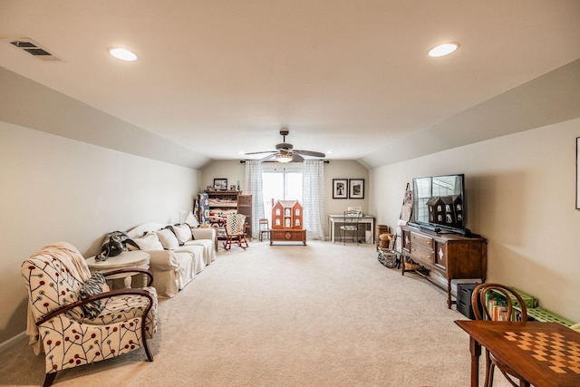 living room featuring light carpet, ceiling fan, and lofted ceiling