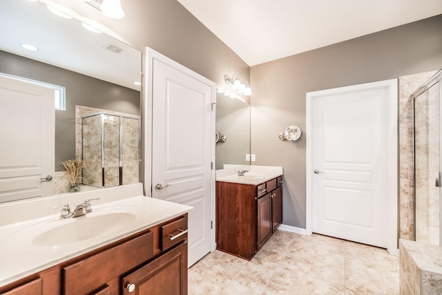 bathroom featuring vanity and a shower with door