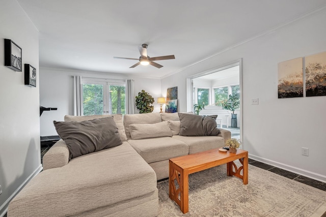 tiled living room featuring french doors, ceiling fan, and crown molding