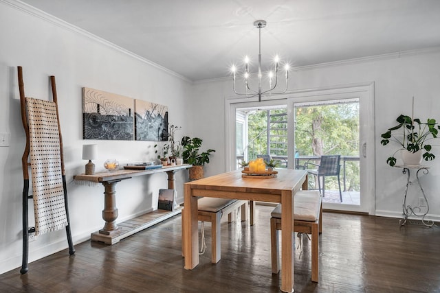 dining area featuring ornamental molding, dark hardwood / wood-style floors, and a notable chandelier