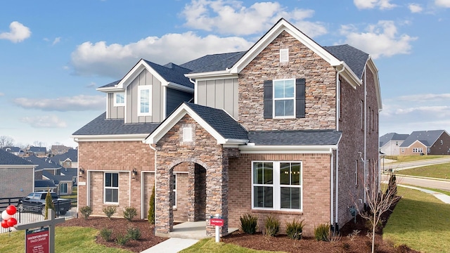 view of front of home with a front yard