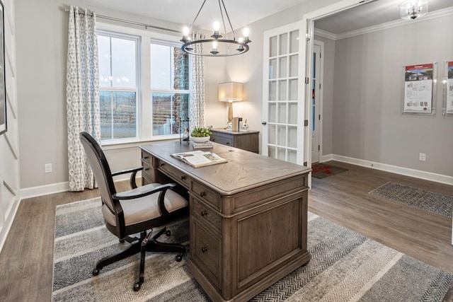 office area with a chandelier, hardwood / wood-style floors, and ornamental molding