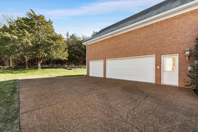 garage with a yard