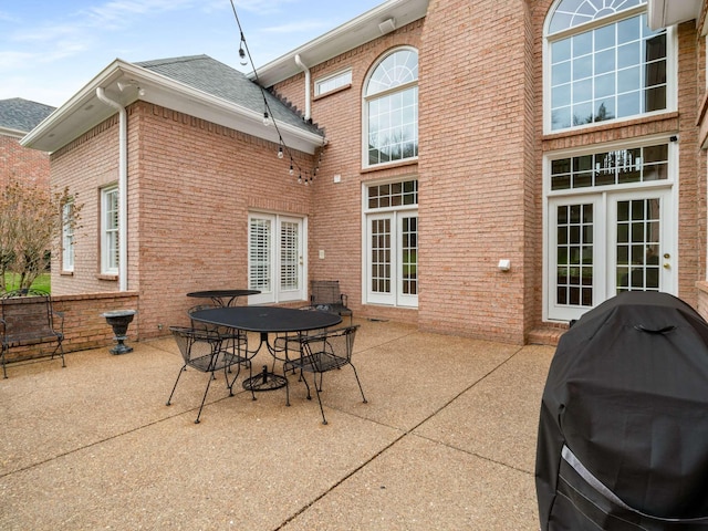 view of patio featuring french doors and grilling area