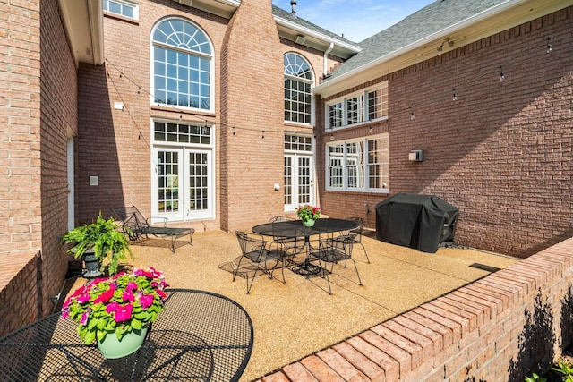 view of patio / terrace with grilling area and french doors