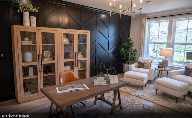 office space featuring ornamental molding and a notable chandelier