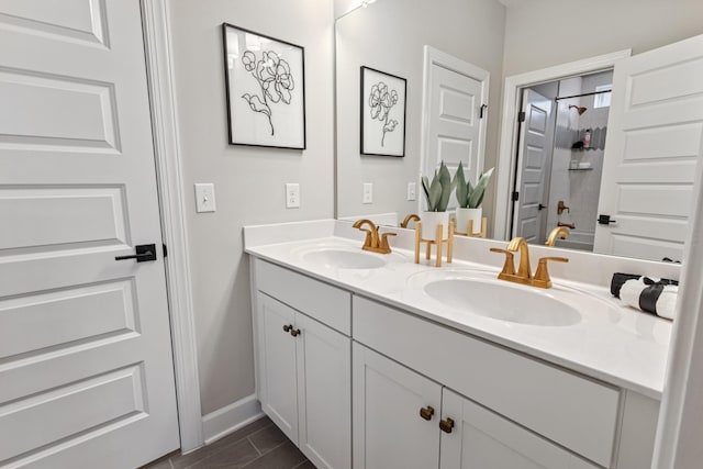 bathroom featuring tile patterned floors, vanity, and shower / bathing tub combination