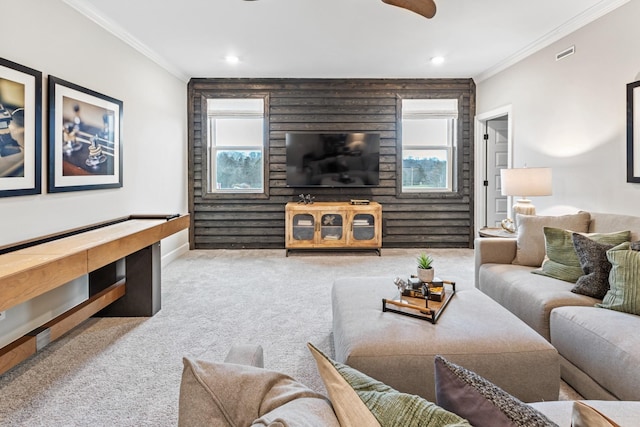 living room featuring light carpet and ornamental molding