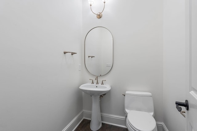 bathroom featuring toilet