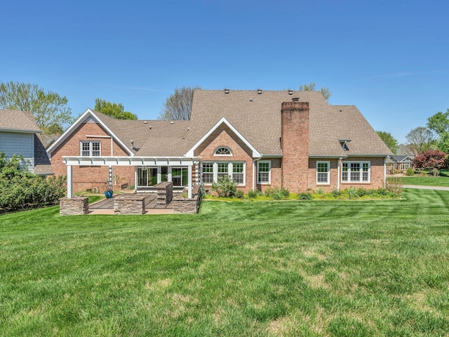 409 Savannah Trace Dr, Clarksville, TN 37043 - rear view of house featuring brick siding, a patio area, a lawn, and a pergola