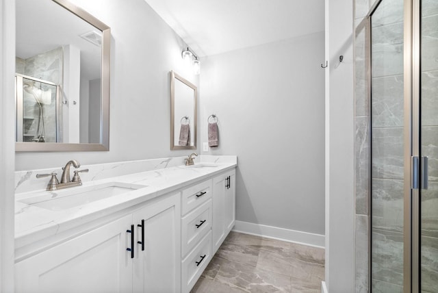 bathroom featuring vanity and walk in shower