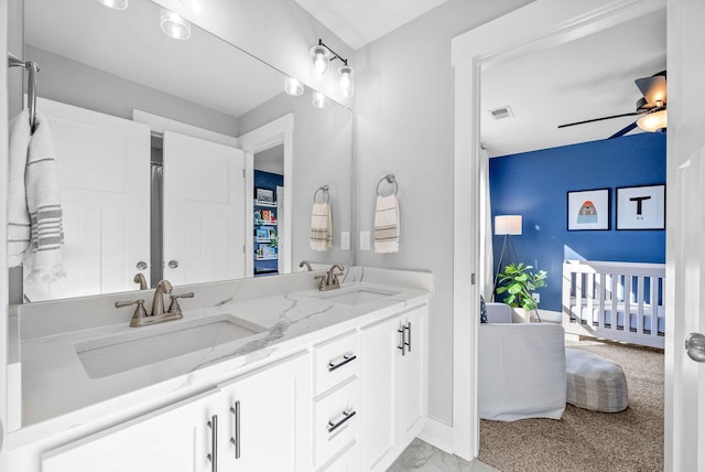 bathroom featuring vanity and ceiling fan