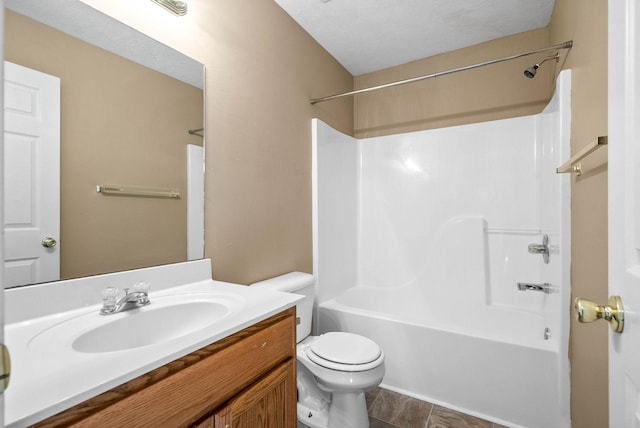 full bathroom featuring shower / bath combination, tile patterned floors, a textured ceiling, vanity, and toilet