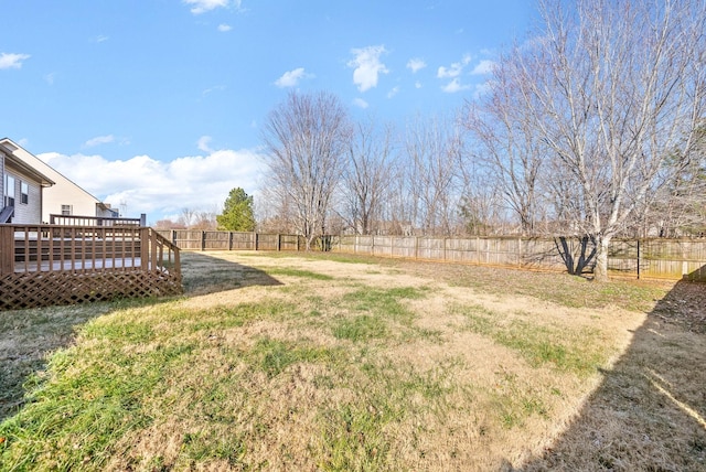 view of yard featuring a deck