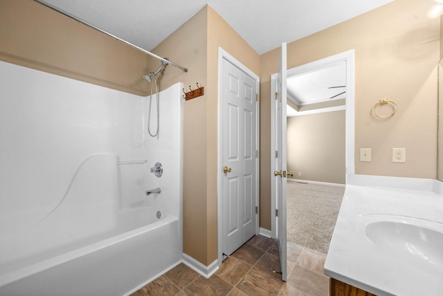 bathroom with bathtub / shower combination and vanity