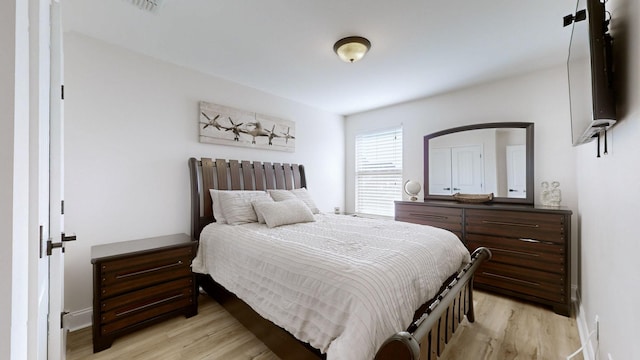 bedroom featuring light hardwood / wood-style flooring