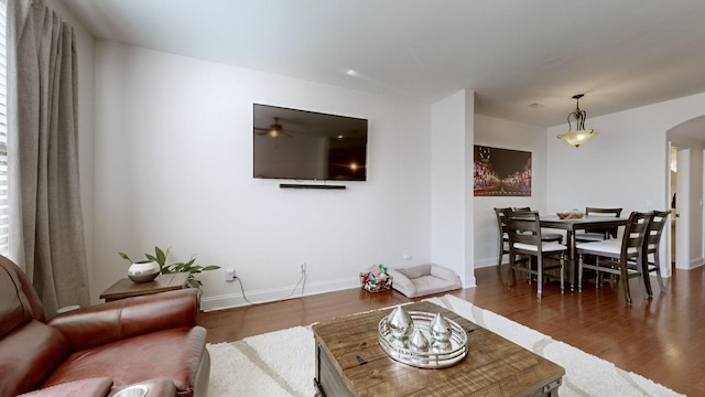 living room with dark wood-type flooring