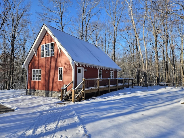 exterior space featuring a wooden deck