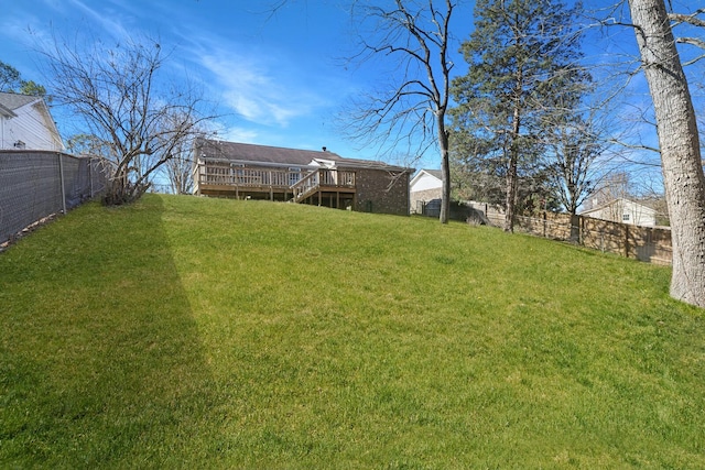 view of yard featuring a deck