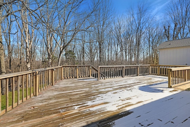 view of snow covered deck