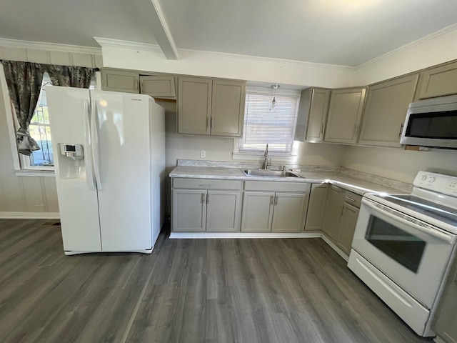 kitchen with gray cabinets, dark hardwood / wood-style flooring, white appliances, and sink