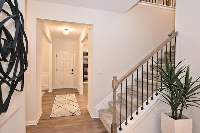 foyer with hardwood / wood-style floors