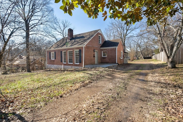 exterior space featuring a yard and a patio