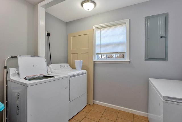 washroom with light tile patterned floors, electric panel, and independent washer and dryer