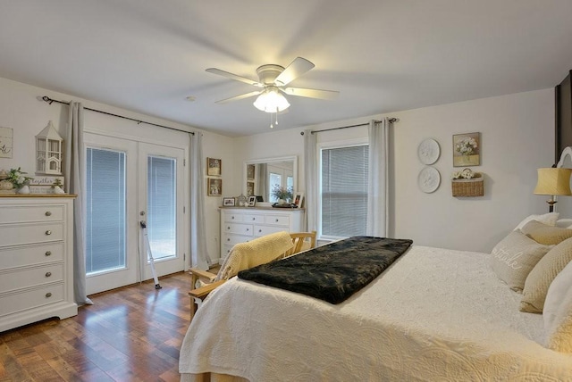 bedroom featuring dark hardwood / wood-style floors, ceiling fan, french doors, and access to outside