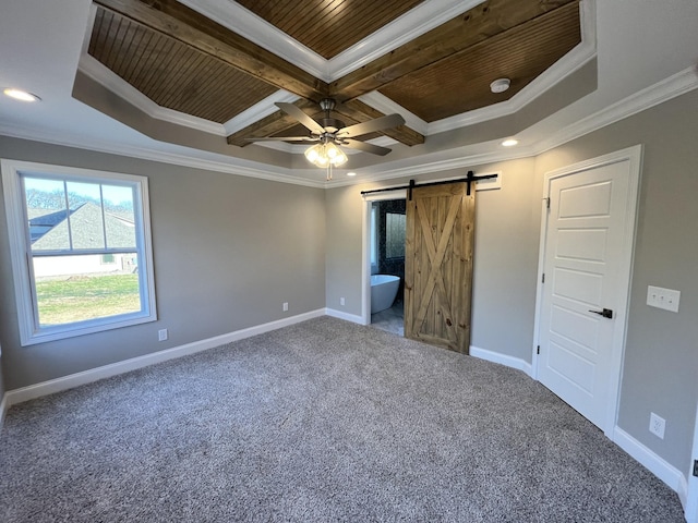 unfurnished bedroom featuring a barn door, ensuite bathroom, wood ceiling, and ornamental molding