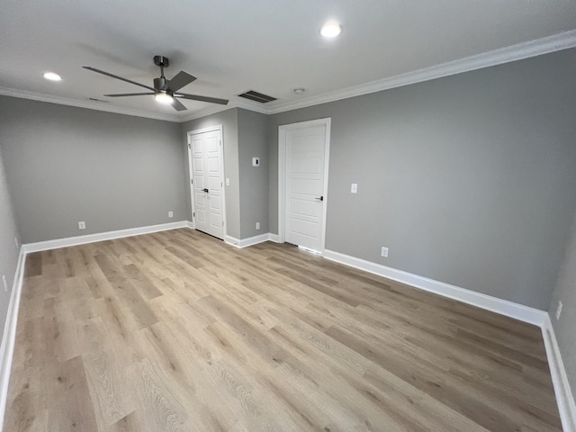 unfurnished bedroom with light hardwood / wood-style floors, ceiling fan, and crown molding