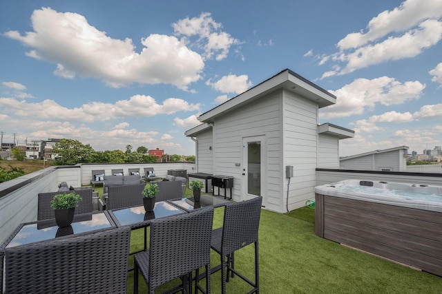 wooden deck featuring an outdoor hangout area, a yard, and a hot tub