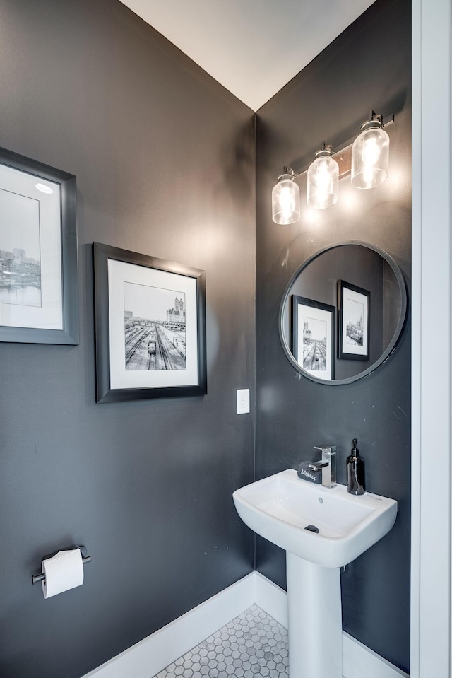 bathroom with tile patterned floors