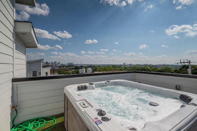 balcony with a hot tub