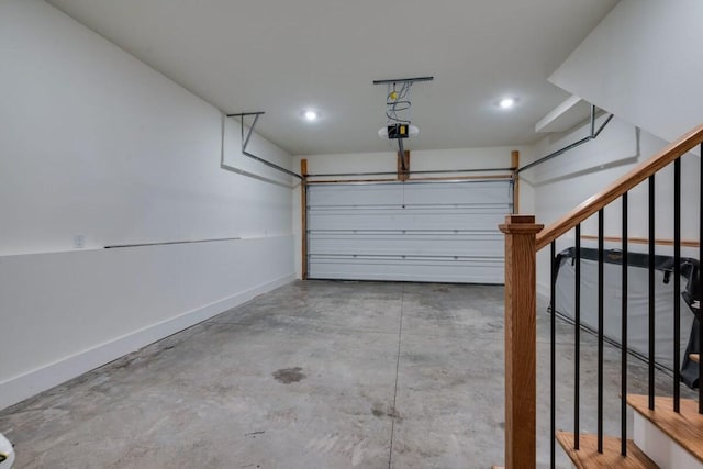 garage featuring a garage door opener