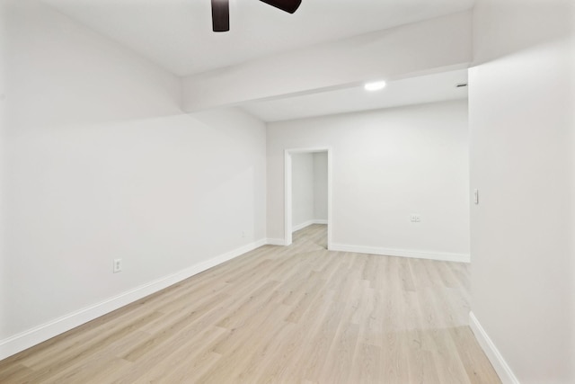 spare room with ceiling fan and light hardwood / wood-style floors