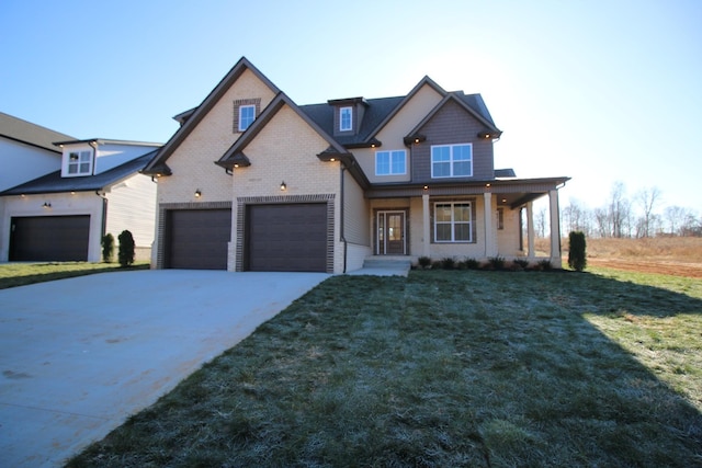 view of front facade featuring covered porch, a garage, and a front yard