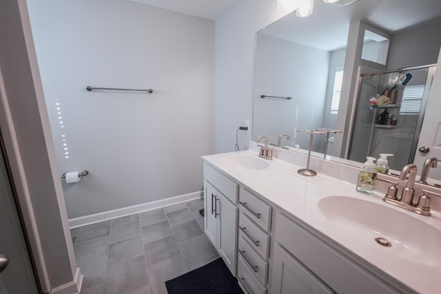 bathroom with vanity and an enclosed shower