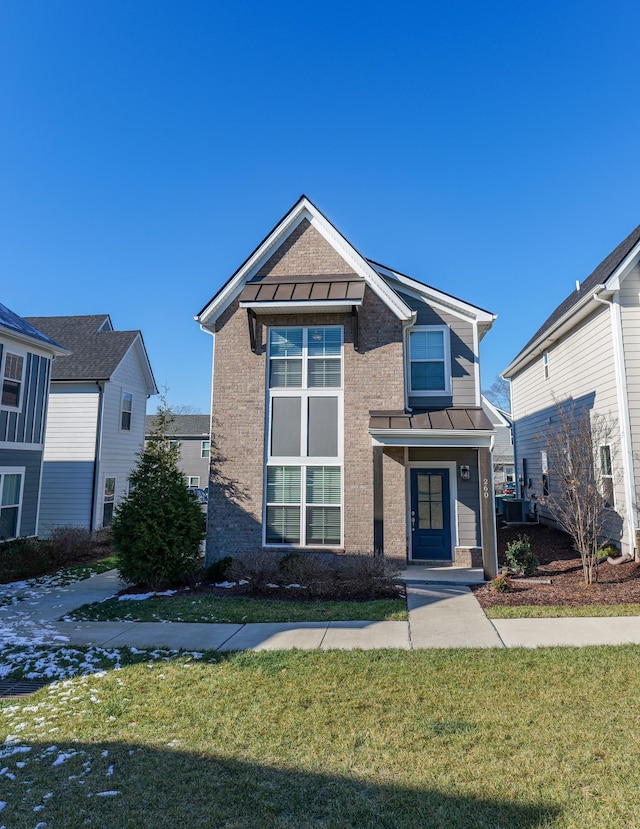 view of front of house featuring a front lawn