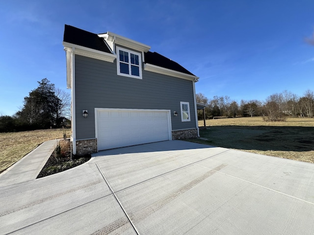 view of home's exterior with a garage