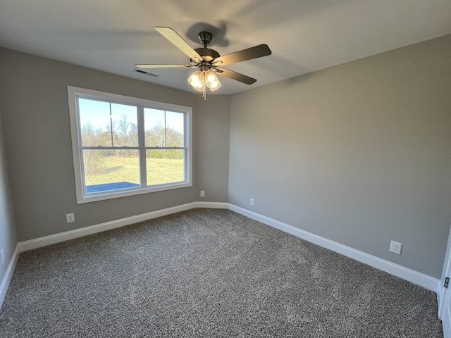 carpeted empty room with ceiling fan